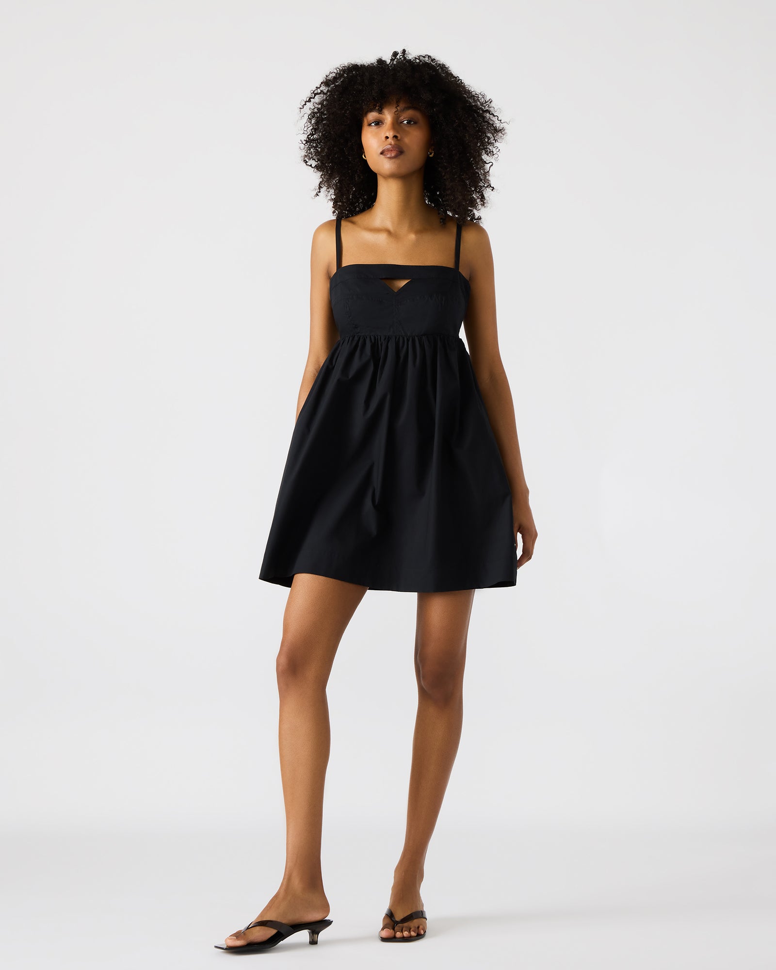 MEADOW Black Mini Cut-Out Flowy Dress | Steve Madden