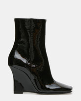 EVOQUE Black Patent Slanted-Toe Wedge Women's Ankle Boot | Steve Madden